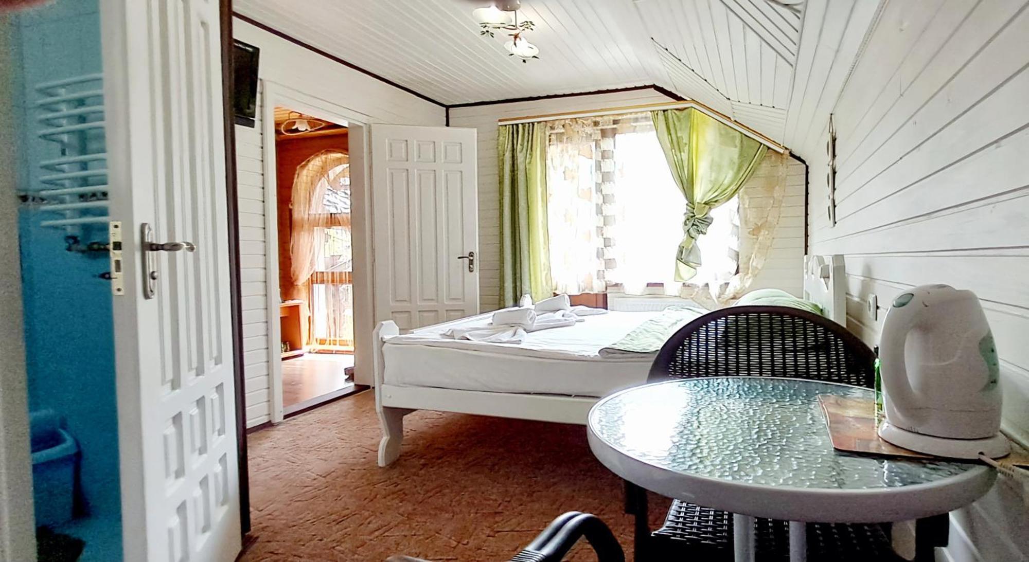 Girska Sonata Hotel & Apartments Mykulychyn Quarto foto